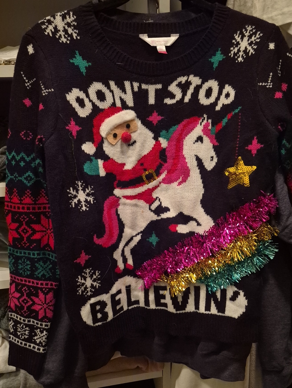 No Boundaries Holiday Unicorn Santa Sweater with Tinsel